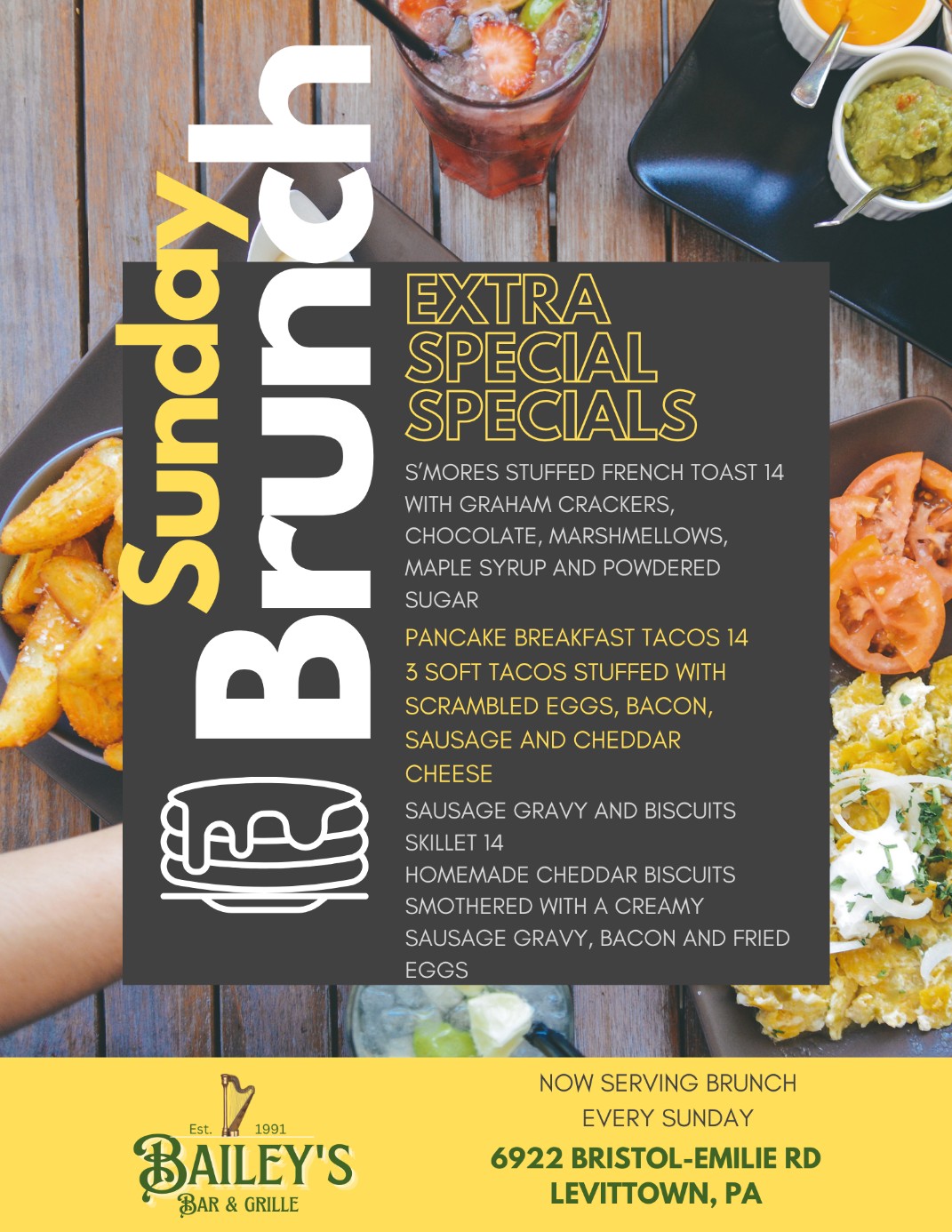 Brunch menu with a variety of dishes on a wooden table.